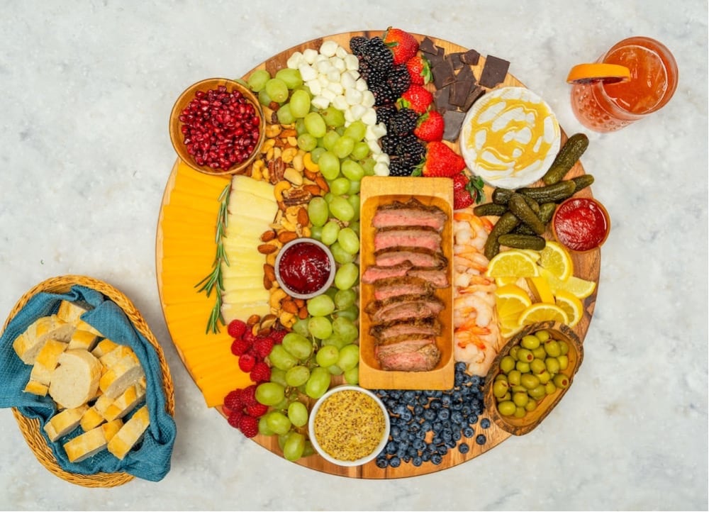 steak charcuterie board with fruits and vegetables