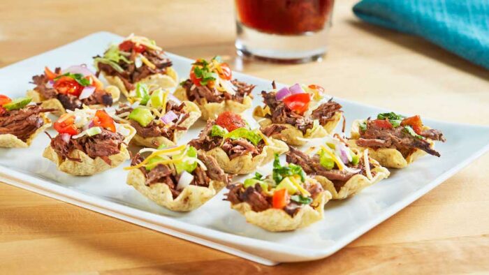 mini tacos with barbacoa and natural angus beef