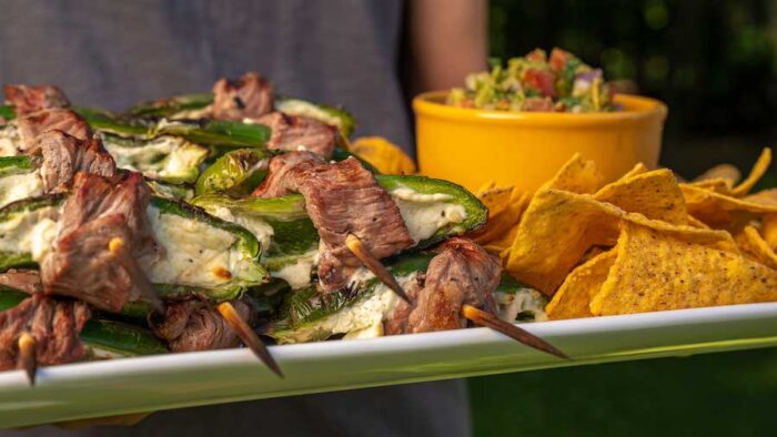 natural angus top sirloin-wrapped jalapeno poppers with grilled gaucamole
