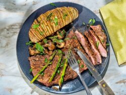 marinated and grilled flap steak with hasselback potato